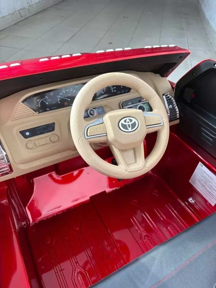 Детский электромобиль Baby Driver  Toyota Tundra J111 (красный глянец) фото