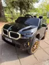 Детский электромобиль Baby Driver E005BB BMW-XM (черный автокраска) фото 2