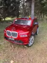 Детский электромобиль Baby Driver E007BB BMW X7 (красный глянец) Полноприводный фото 2