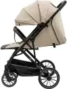 Детская прогулочная коляска INDIGO Delta+ (бежевый) icon 5